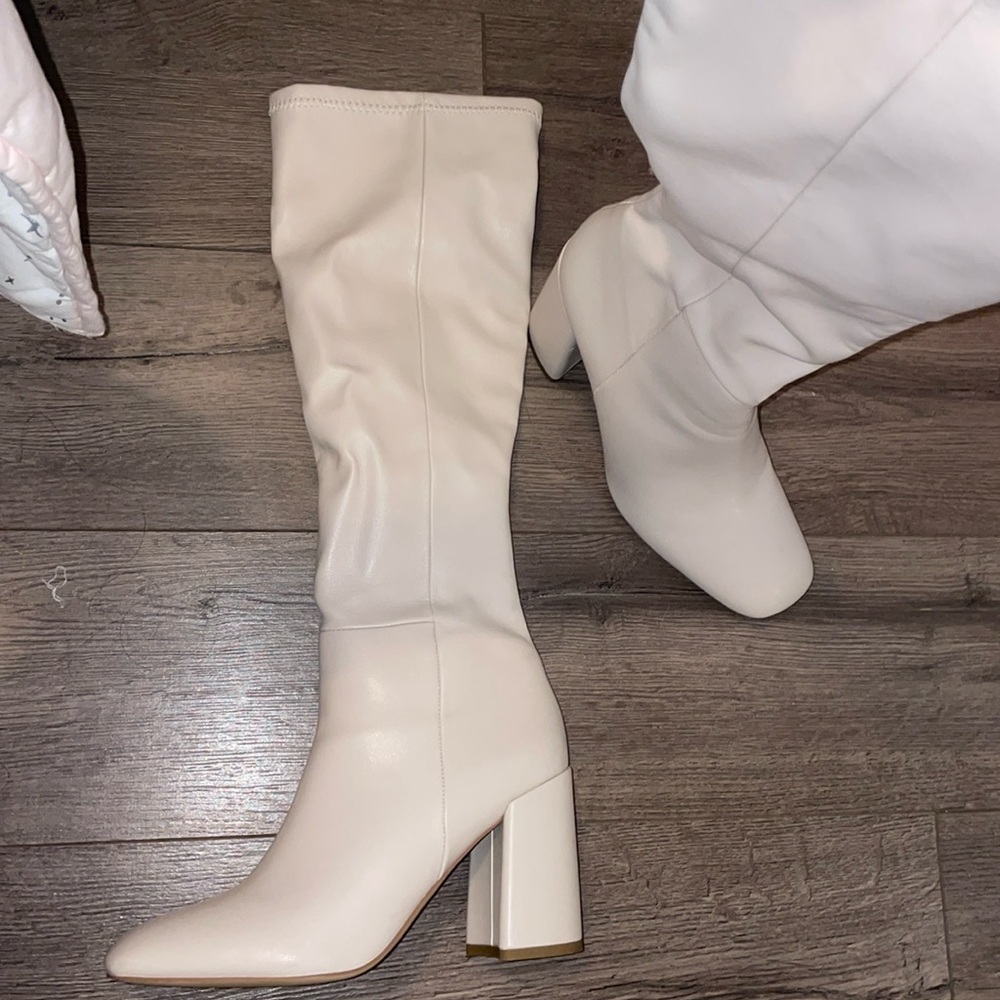 White knee high boots